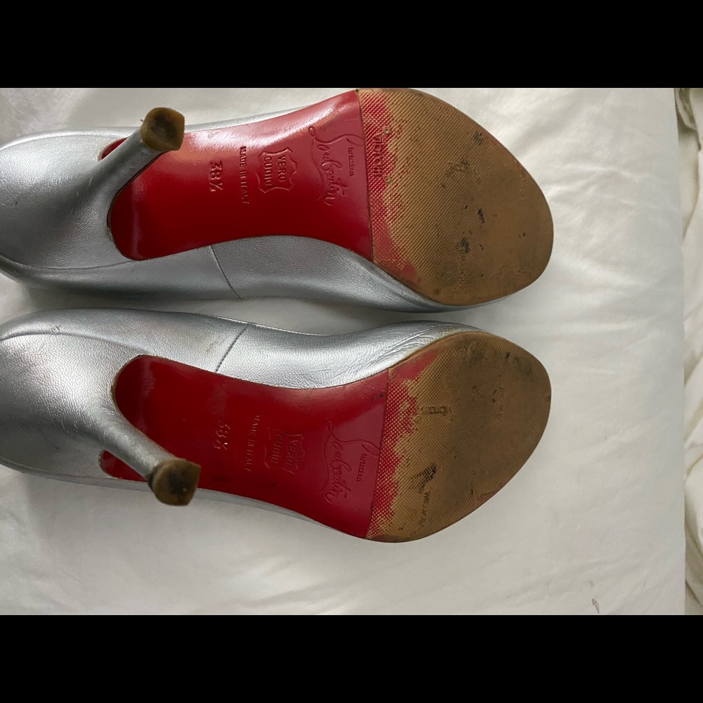 Christian Louboutin peep toe metallic silver pump
